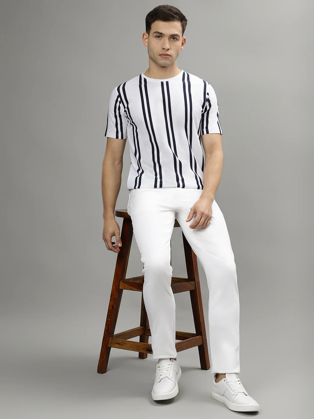LINDBERGH Men White Solid Mid-Rise Tapered Fit Jeans - Image 4